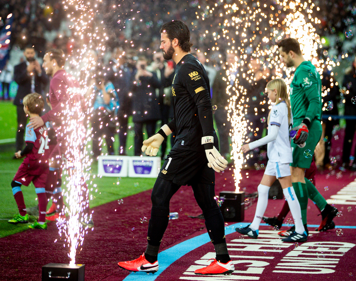 LONDON, ENGLAND - Wednesday, January 29, 2020: Liverpool's goalkeeper Alisson Becker walks out through pyrotechnics before the FA Premier League match between West Ham United FC and Liverpool FC at the London Stadium. (Pic by David Rawcliffe/Propaganda)