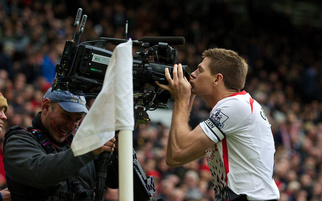 Liverpool's captain Steven Gerrard celebrates scoring the second goal against Manchester United from the penalty spot by kissing the television camera during the Premiership match at Old Trafford.