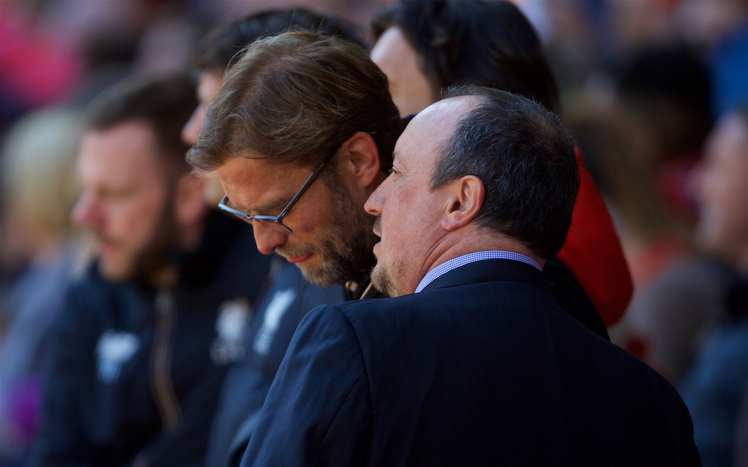 Jurgen Klopp shares a joke with Newcastle United's manager Rafael Benitez during the Premier League match at Anfield.