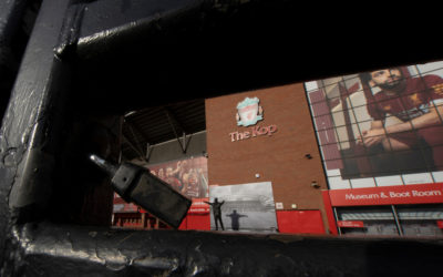 A padlock on a gate at a near deserted Anfield, home of Champions-elect Liverpool Football Club, after the suspension of all football due to the Coronavirus (COVID-19) and Liverpool’s decision to close it’s Boot Room cafe and official stores