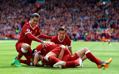 Liverpool's Adam Lallana celebrates scoring the third goal against Middlesbrough during the FA Premier League match at Anfield