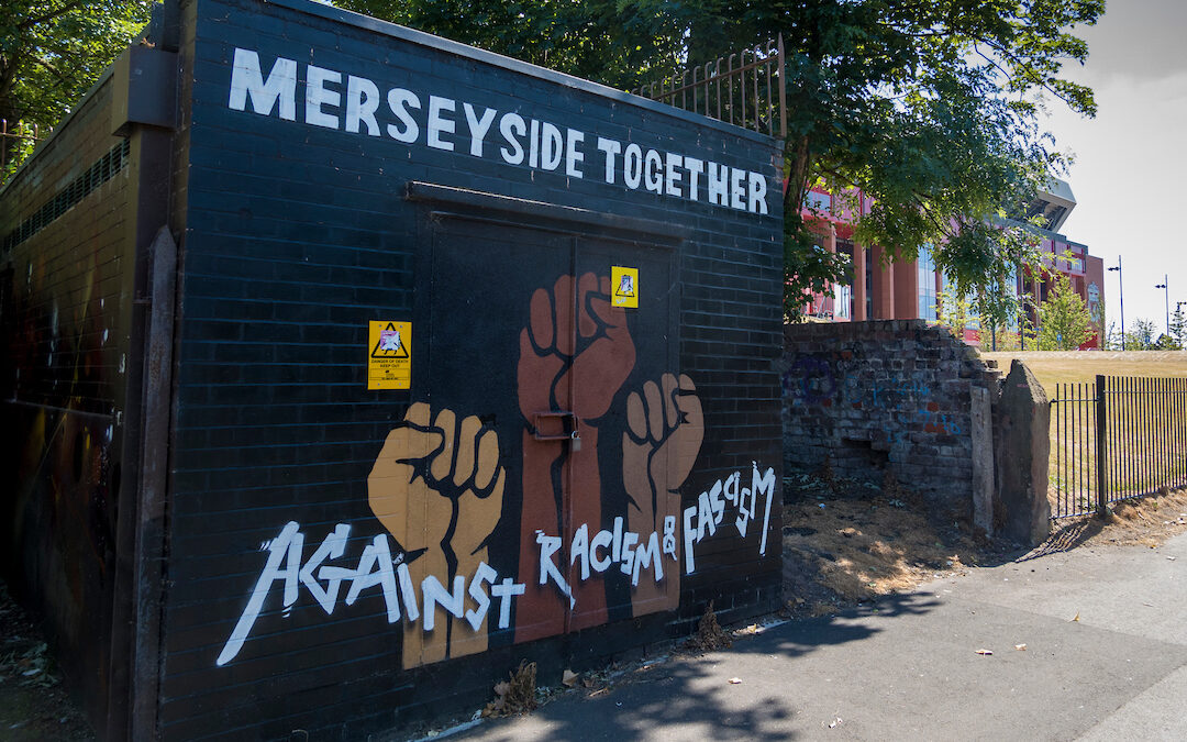 “Merseyside Together Against Racism and Fascism” Graffiti painted on a wall in Stanley Park, Anfield, between Liverpool FC’s and Everton FC’s stadiums