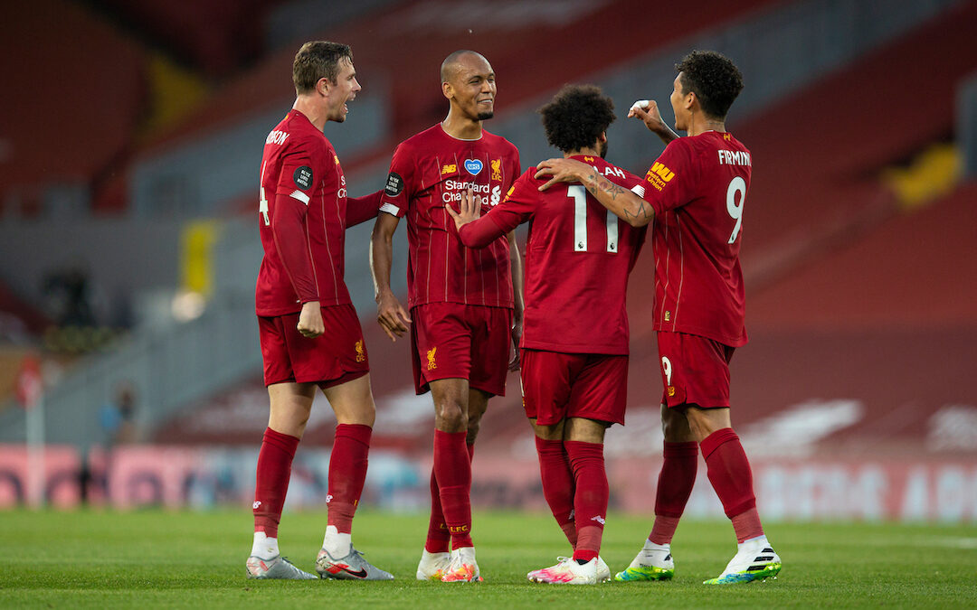 Liverpool’s Fabio Henrique Tavares 'Fabinho' (2nd from L) celebrates scoring the third goal with team-mates captain Jordan Henderson (L), Mohamed Salah (2nd from R) and Roberto Firmino during the FA Premier League match between Liverpool FC and Crystal Palace FC at Anfield.