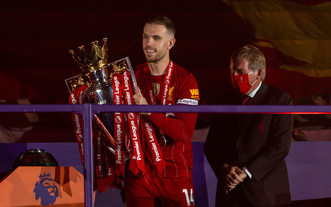 Jordan Henderson collects the trophy as Liverpool FC are crowned Premier League Champions