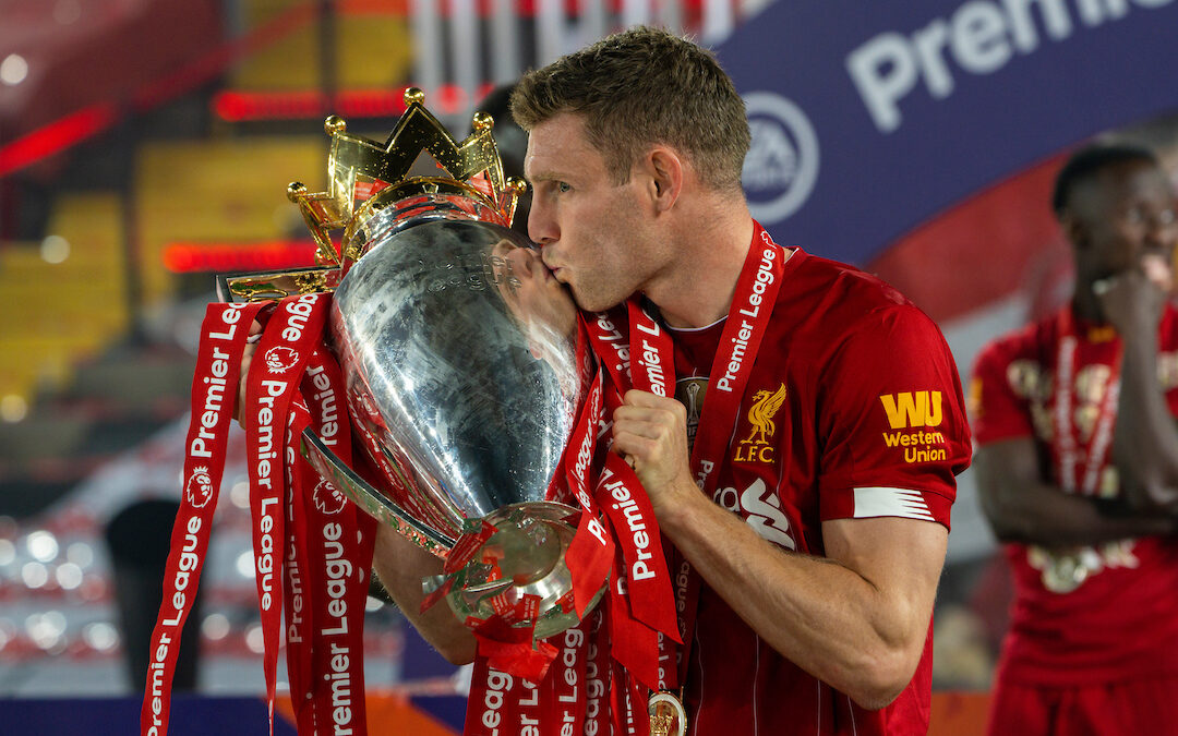 Liverpool’s James Milner kisses the Premier League trophy as the Reds are crowned Champions after the FA Premier League match between Liverpool FC and Chelsea FC at Anfield