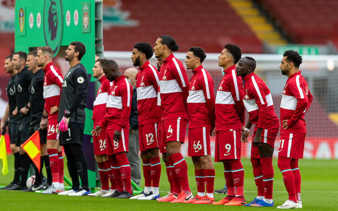 Liverpool FC players line up at Anfield