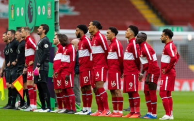 Liverpool FC players line up at Anfield