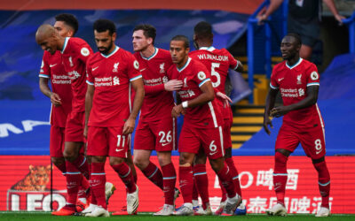 Liverpool players celebrate the opening goal with a header during the FA Premier League match between Chelsea FC and Liverpool FC at Stamford Bridge
