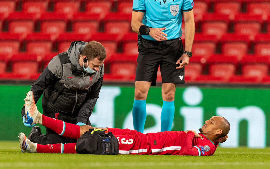 Liverpool's Fabio Henrique Tavares 'Fabinho' is treated for an injury during the UEFA Champions League Group D match between Liverpool FC and FC Midtjylland at Anfield.