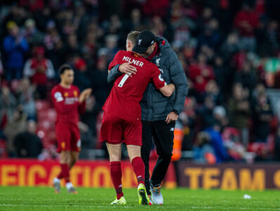 Liverpool's manager Jürgen Klopp embraces James Milner