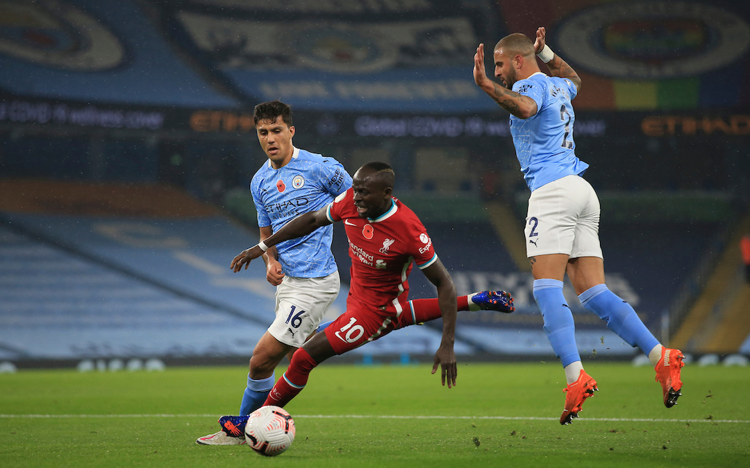 Liverpool's Sadio Mané is fouled by Manchester City's Kyle Walker for a penalty during the FA Premier League match between Manchester City FC and Liverpool FC at the Etihad Stadium