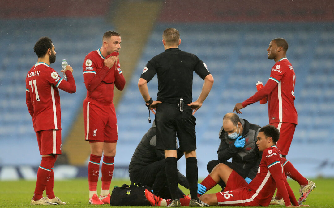 Liverpool's Trent Alexander-Arnold receives treatment for an injury that forced him out of the game during the FA Premier League match between Manchester City FC and Liverpool FC at the Etihad Stadium