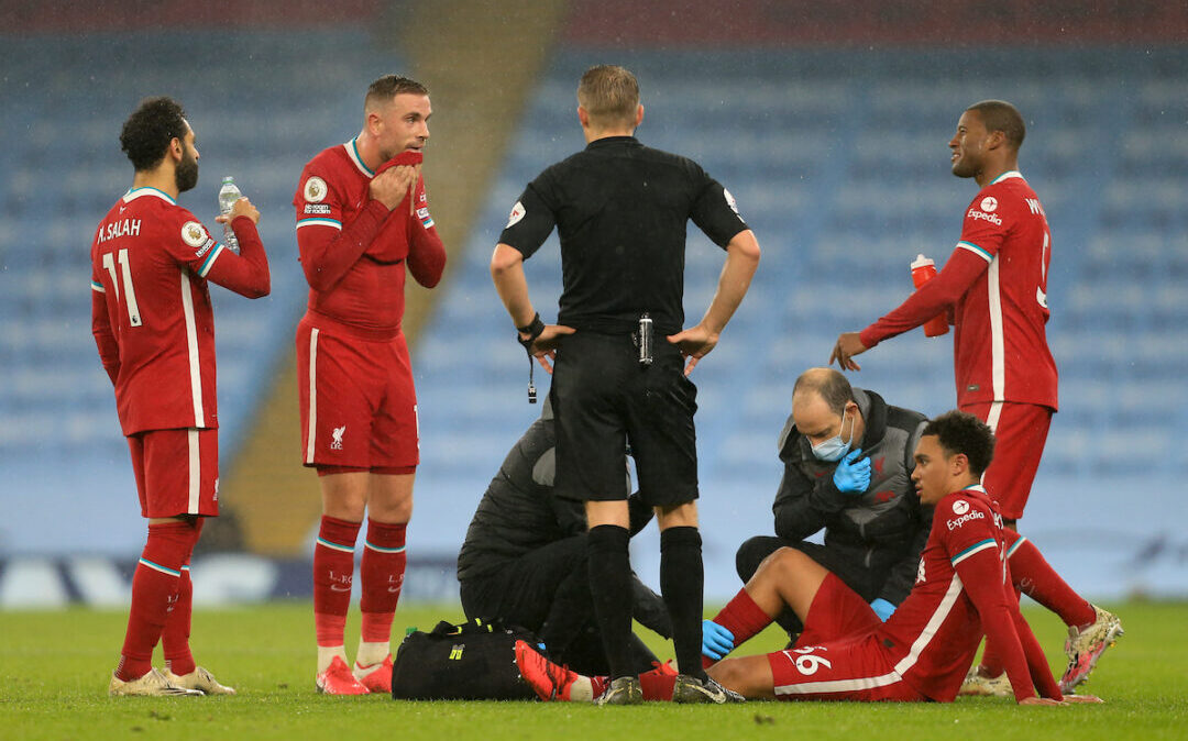 Liverpool's Trent Alexander-Arnold receives treatment for an injury that forced him out of the game during the FA Premier League match between Manchester City FC and Liverpool FC at the Etihad Stadium