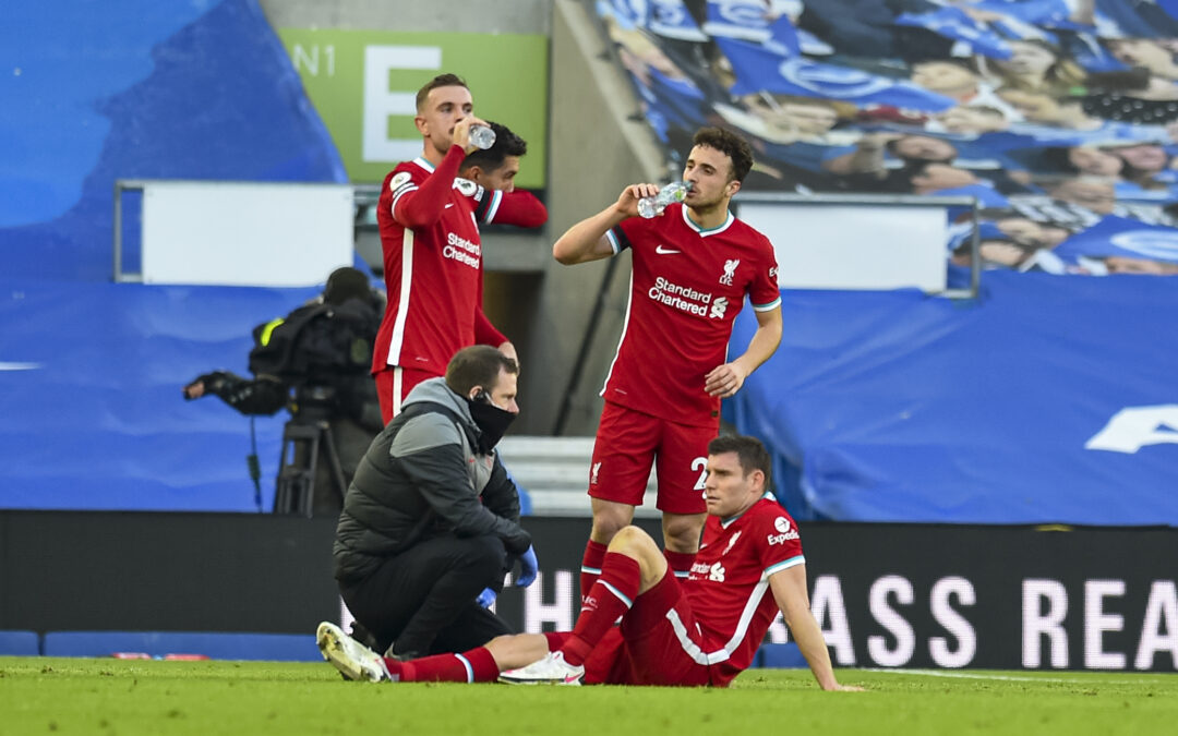 Liverpool's James Milner is treated for an injury during the FA Premier League match between Brighton & Hove Albion FC and Liverpool FC at the AMEX Stadium