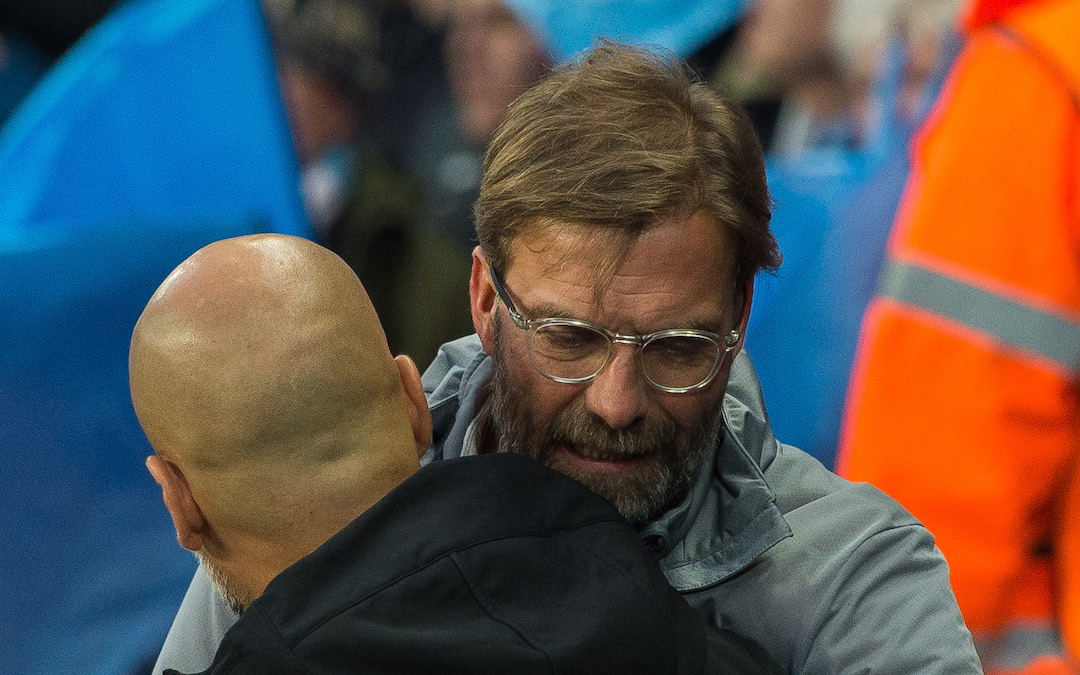 Jurgen Klopp manager of Liverpool and Pep Guardiola manager of Manchester City react before the match at the Etihad Stadium