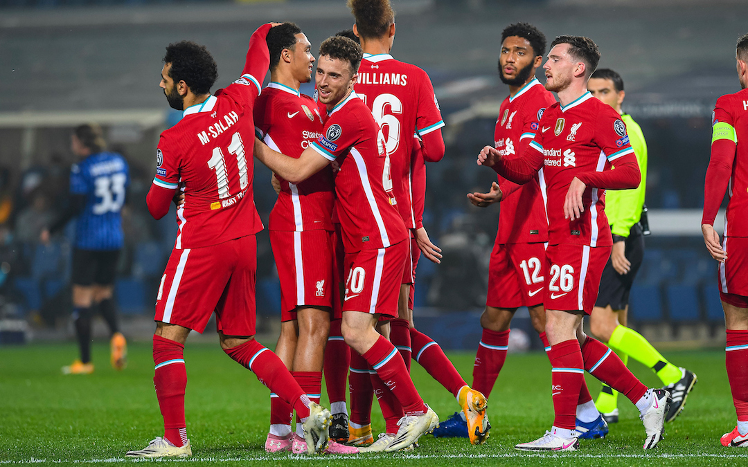 Liverpool's Diogo Jota (C) celebrates after scoring the first goal with team-mates during the UEFA Champions League Group D match between Atalanta BC and Liverpool FC at the Stadio di Bergamo