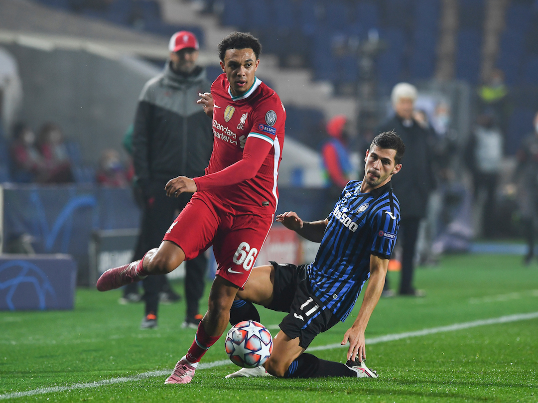Liverpool's Trent Alexander-Arnold (L) gets past Atalanta's Remo Freuler during the UEFA Champions League Group D match between Atalanta BC and Liverpool FC at the Stadio di Bergamo.