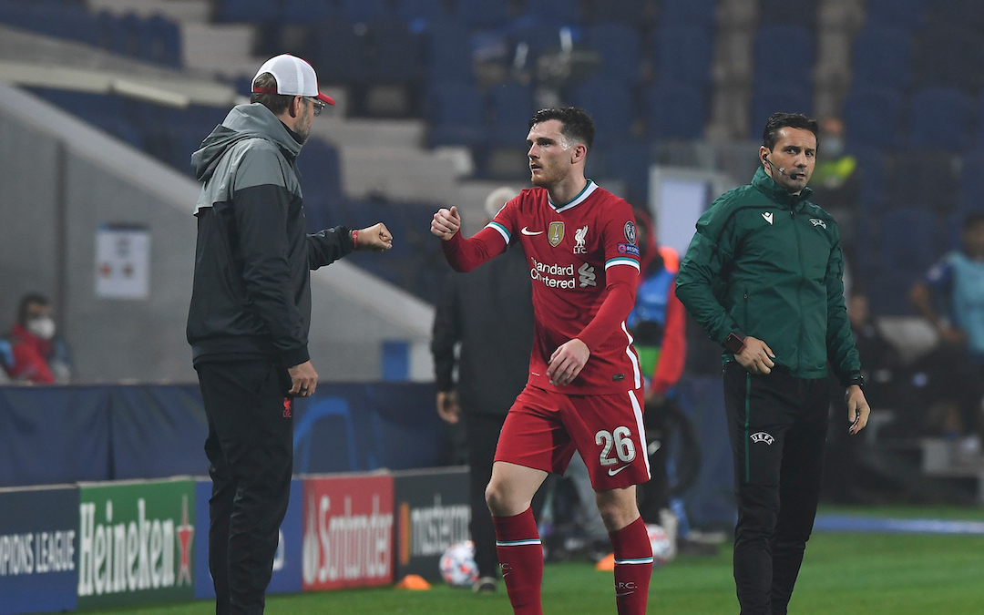 Liverpool's manager Jürgen Klopp (L) fist bumps Andy Robertson during the UEFA Champions League Group D match between Atalanta BC and Liverpool FC at the Stadio di Bergamo.