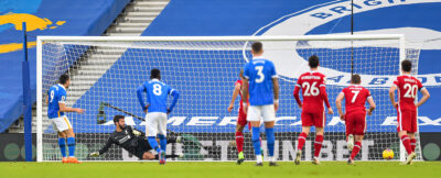 Neal Maupay sends his penalty kick wide during the FA Premier League match between Brighton & Hove Albion FC and Liverpool FC at the AMEX Stadium