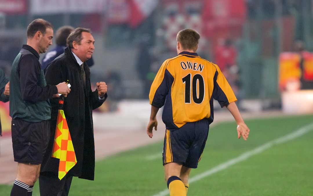 Liverpool's Michael Owen celebrates his goal against AS Roma with manager Gerard Houllier