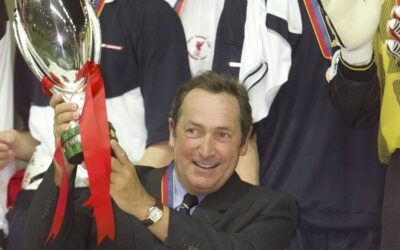 Liverpool's manager Gerard Houllier lifts the UEFA Super Cup