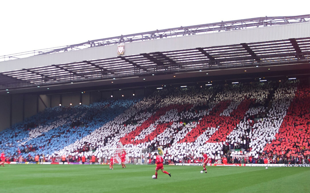 Liverpool's supporters on the Spion Kop pay tribute to manager Gerard Houllier