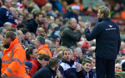 Liverpool's manager Jürgen Klopp shares a joke with a supporter at Anfield