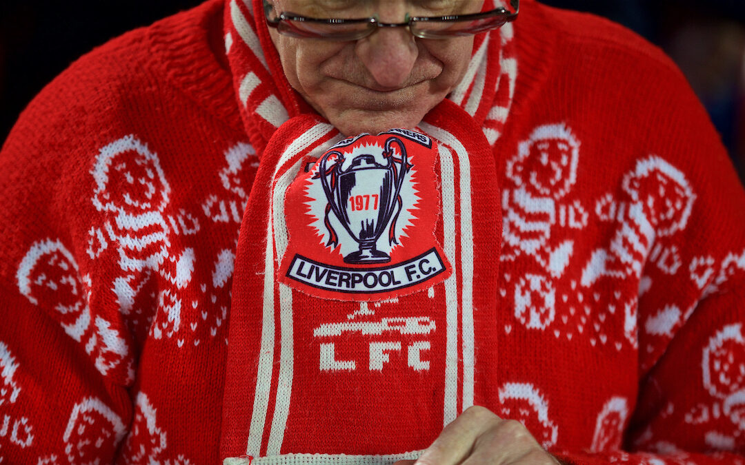 A Liverpool supporter wearing a Christmas jumper
