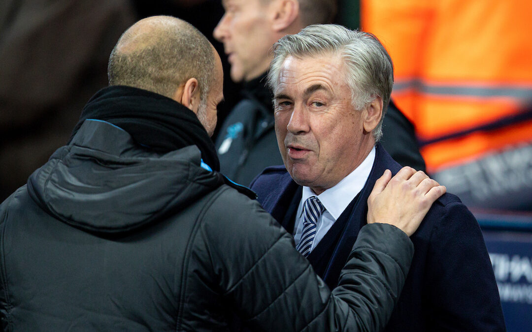 Everton's manager Carlo Ancelotti (R) and Manchester City's manager Pep Guardiola