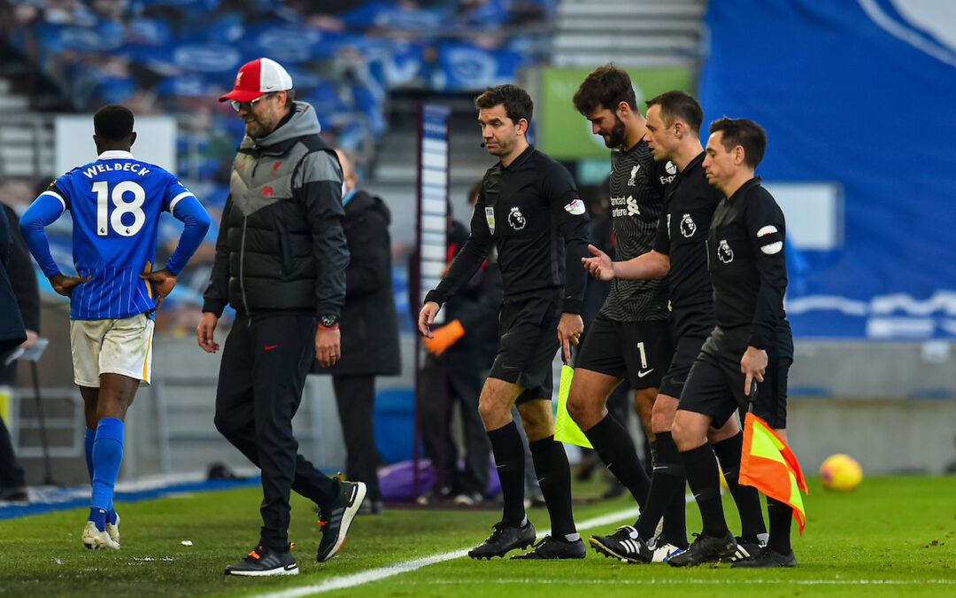 Liverpool's Jürgen Klopp and Alisson Becker speak with referee Stuart Atwell after the FA Premier League match with Brighton & Hove Albion FC