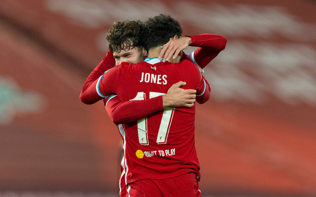 Liverpool's Curtis Jones celebrates with team-mate Neco Williams after scoring during the UEFA Champions League Group D match between Liverpool FC and AFC Ajax at Anfield