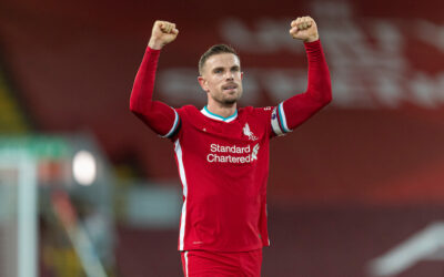 Liverpool's captain Jordan Henderson celebrates at the final whistle during the FA Premier League match between Liverpool FC and Tottenham Hotspur FC at Anfield