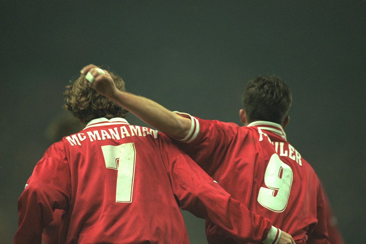 Liverpool's Steve McManaman celebrates scoring with team-mate Robbie Fowler