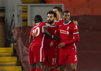 Liverpool's Mohamed Salah celebrates after scoring the first goal during the FA Premier League match between Liverpool FC and Wolverhampton Wanderers FC at Anfield