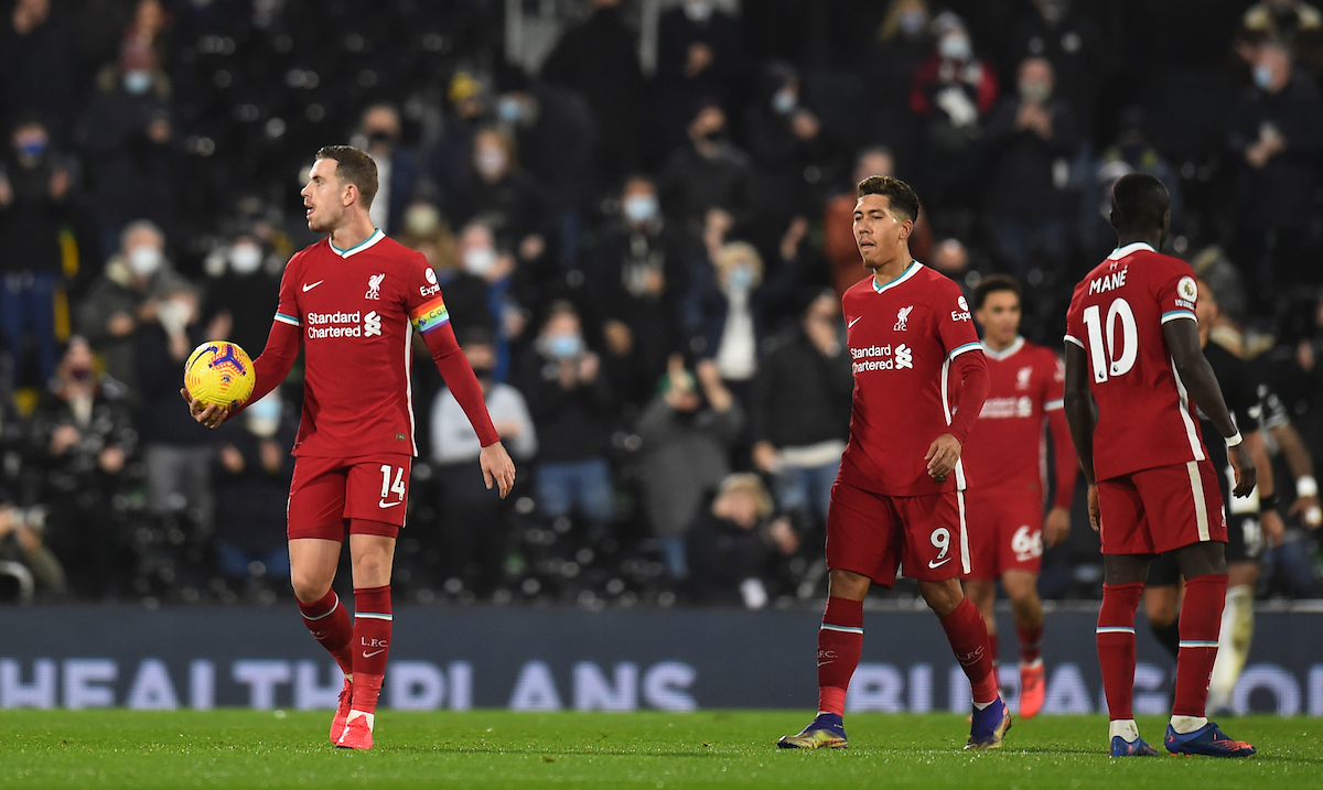 Liverpool players look dejected after Fulham