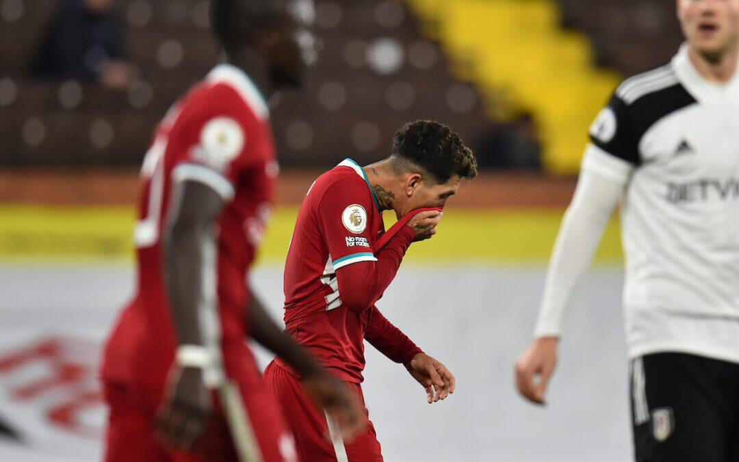 Liverpool's Roberto Firmino looks dejected during the FA Premier League match between Fulham FC and Liverpool FC at Craven Cottage