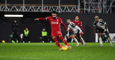 Liverpool's Mohamed Salah scores the first equalising goal from a penalty kick during the FA Premier League match against Fulham FC