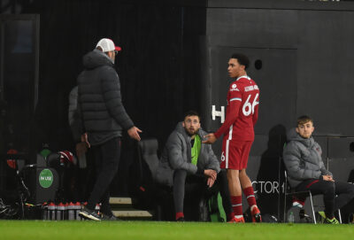 Liverpool's Trent Alexander-Arnold with manager Jürgen Klopp during the FA Premier League match against Fulham FC