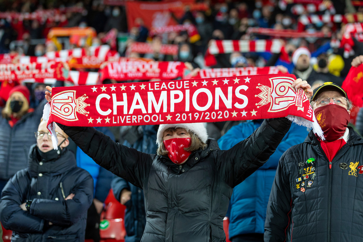 Liverpool supporters sing "You'll Never Walk Alone" on the Spion Kop before the FA Premier League match between Liverpool FC and Tottenham Hotspur FC at Anfield