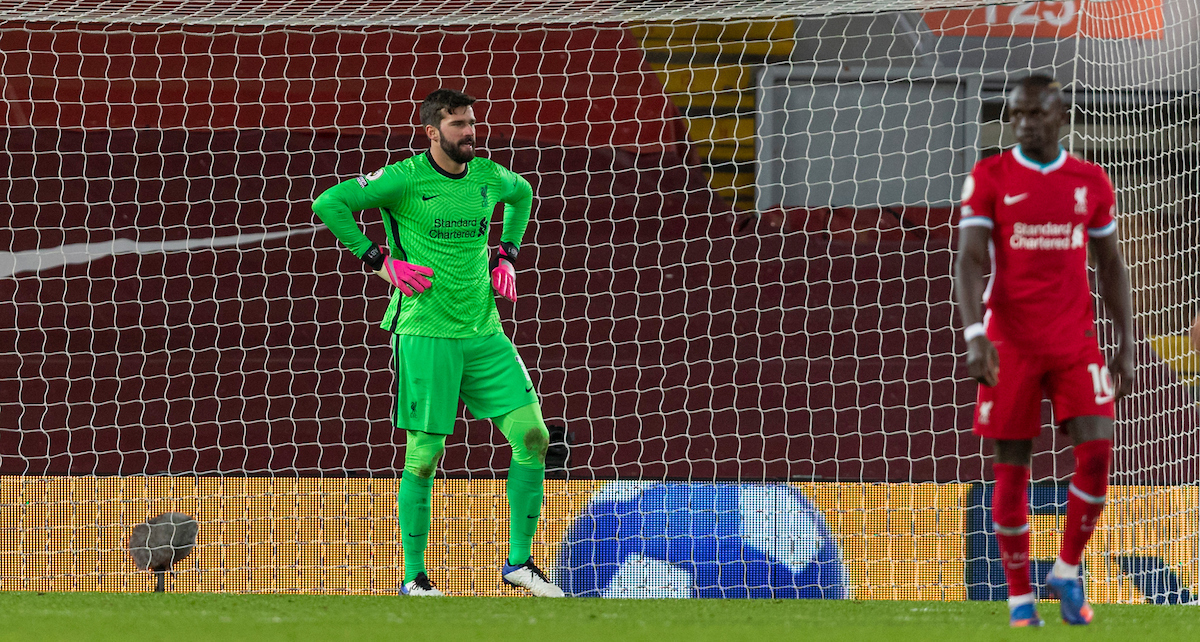 Liverpool's goalkeeper Alisson Becker looks dejected as West Bromwich Albion score the first equalising goal during the FA Premier League match between Liverpool FC and West Bromwich Albion FC at Anfield