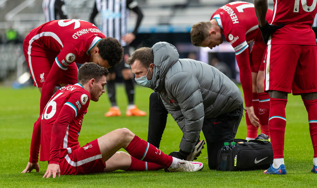 Liverpool’s Andy Robertson receives treatment during the FA Premier League match between Newcastle United FC and Liverpool FC at St James' Park