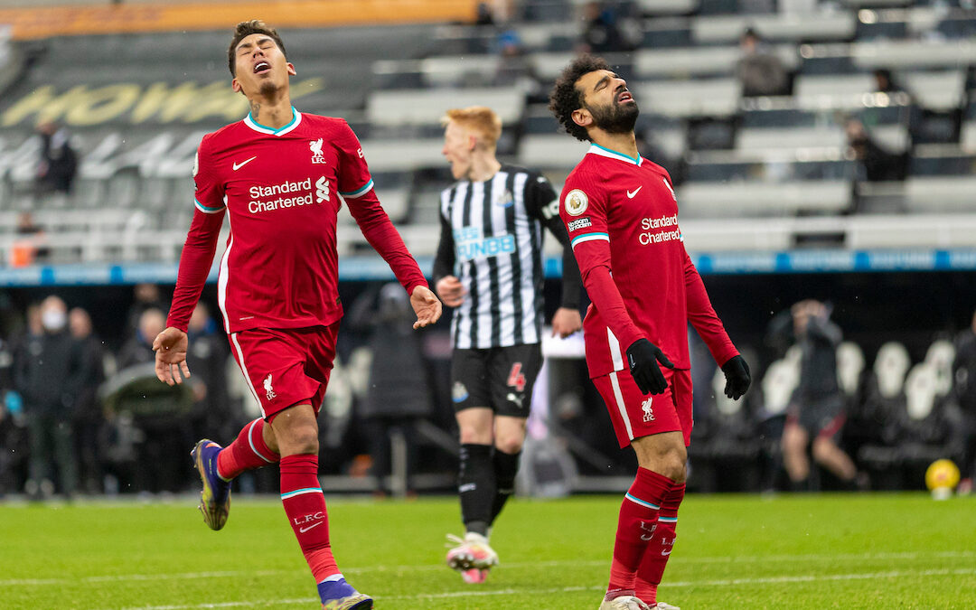 Liverpool’s Mohamed Salah and Roberto Firmino look dejected during the FA Premier League match between Newcastle United FC and Liverpool FC at St James' Park