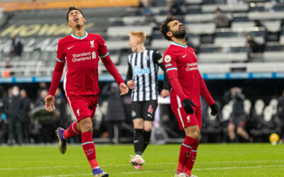 Liverpool’s Mohamed Salah and Roberto Firmino look dejected during the FA Premier League match between Newcastle United FC and Liverpool FC at St James' Park