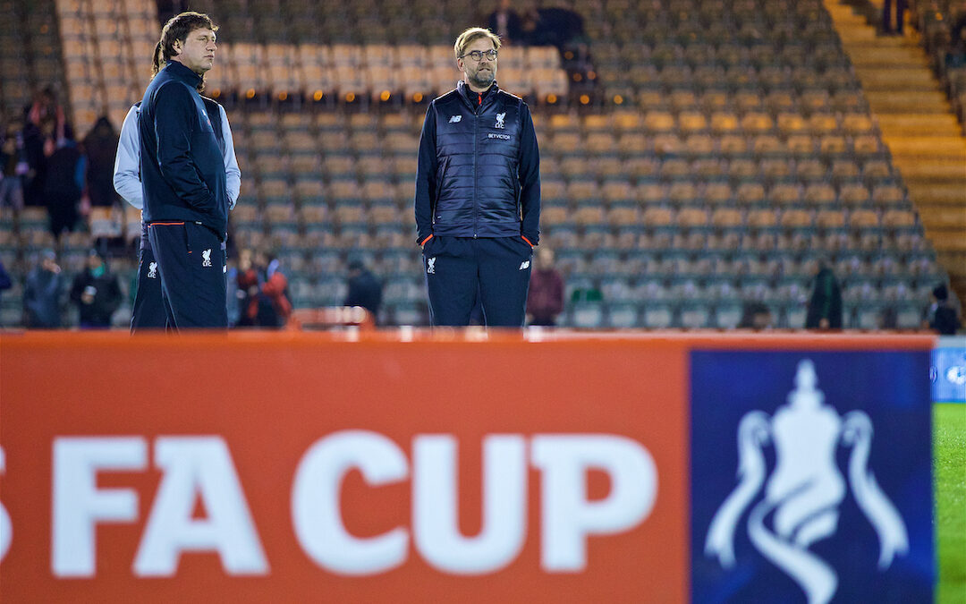 Liverpool's manager Jürgen Klopp inspects the pitch before the FA Cup