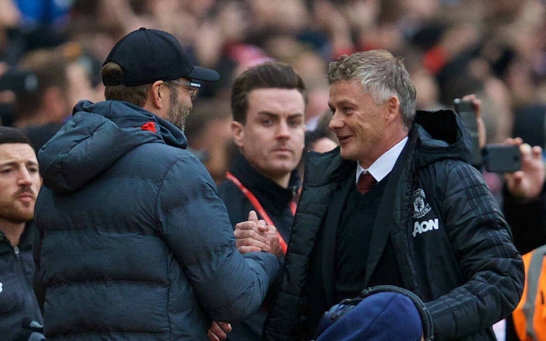Liverpool's manager Jürgen Klopp (L) shakes hands with Manchester United's manager Ole Gunnar Solskjær during the FA Premier League match between Manchester United FC and Liverpool FC