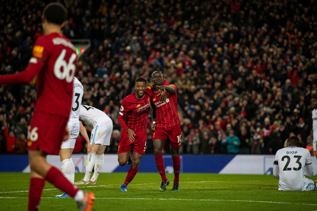 Liverpool's Sadio Mané (R) celebrates with Georginio Wijnaldum during the FA Premier League match between Liverpool FC and West Ham United FC at Anfield