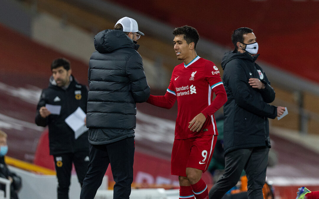 Liverpool's Roberto Firmino shakes hands with manager Jürgen Klopp