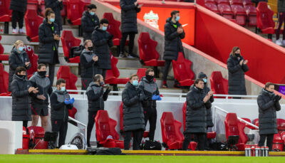 Liverpool's manager Jürgen Klopp and his substitutes and staff stand for a minute's applause to remember the late Gerry Marsden before the FA Premier League match between Liverpool FC and Manchester United FC at Anfield