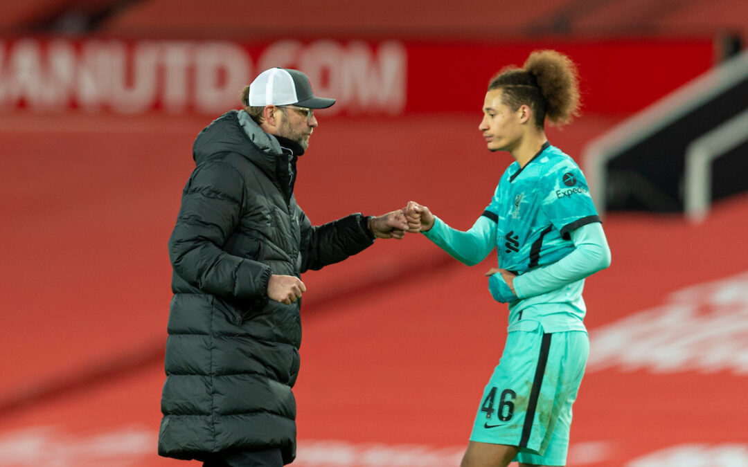 Liverpool's manager Jürgen Klopp fist bumps Rhys Williams after the FA Cup 4th Round match between Manchester United FC and Liverpool FC at Old Trafford