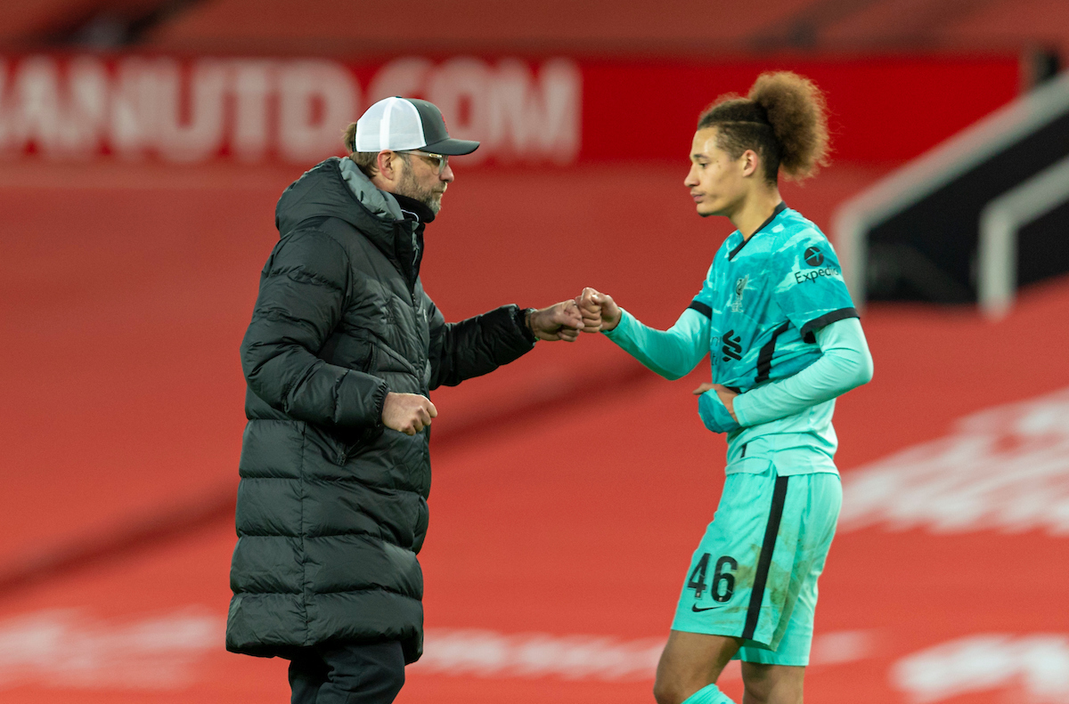 Liverpool's manager Jürgen Klopp fist bumps Rhys Williams after the FA Cup 4th Round match between Manchester United FC and Liverpool FC at Old Trafford